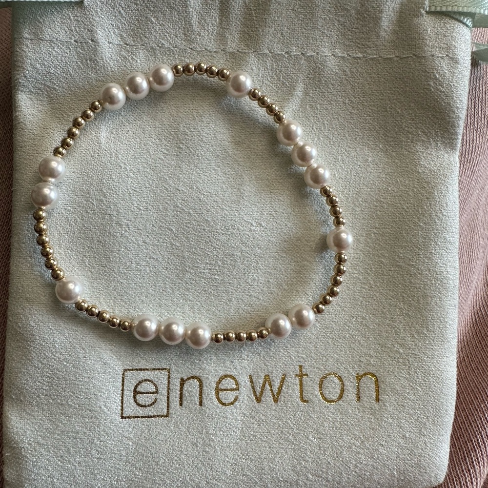 Enewton 6.25 Pearl & Gold. New. Comes with Dust Bag